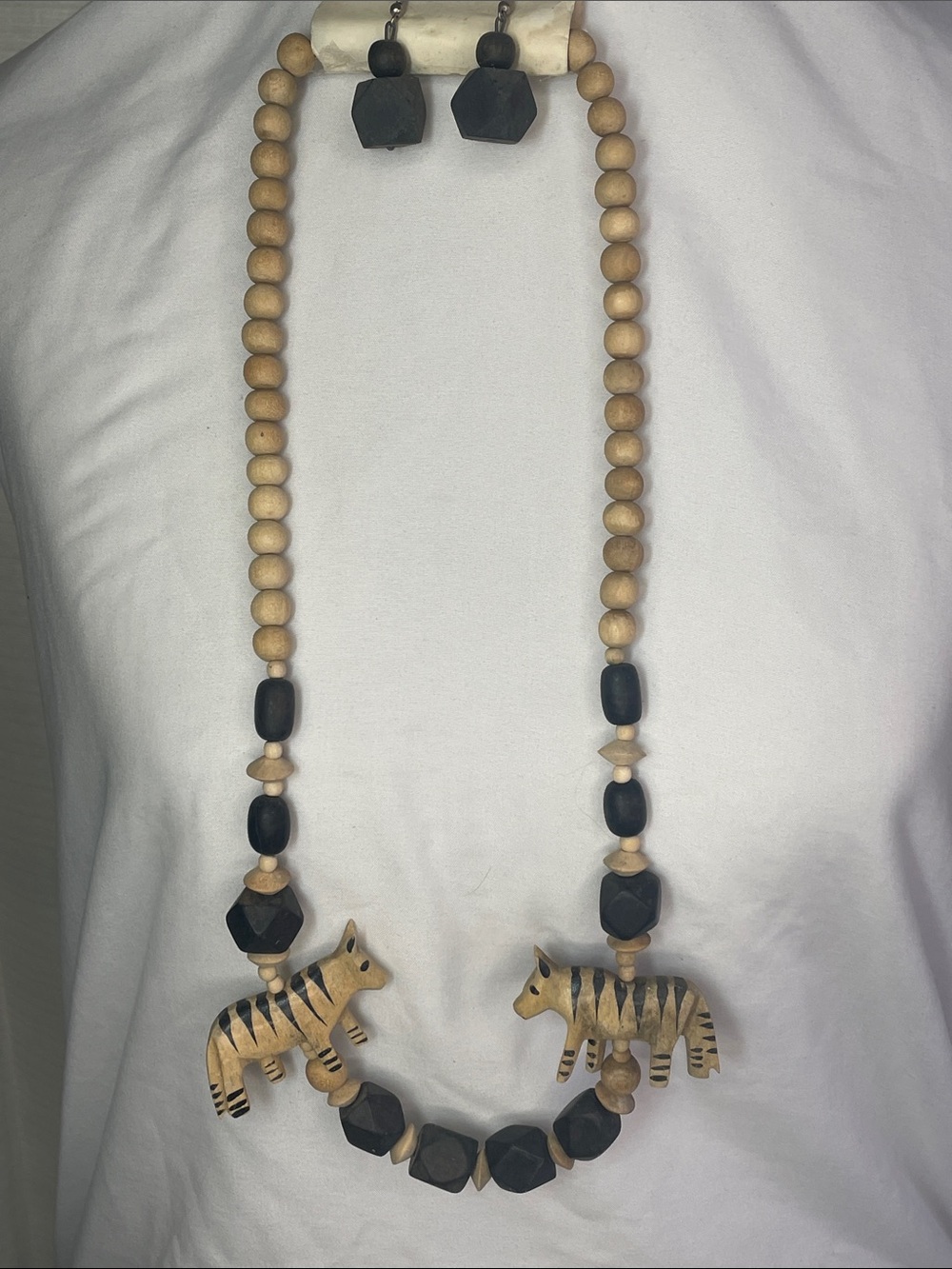 Carved Zebra Wood Bead Necklace with Black Accents